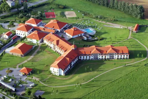 A high angle view of a building in a residential area